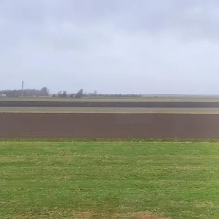 Osterkoog Sonnenuntergang דירה נורדסטרנד